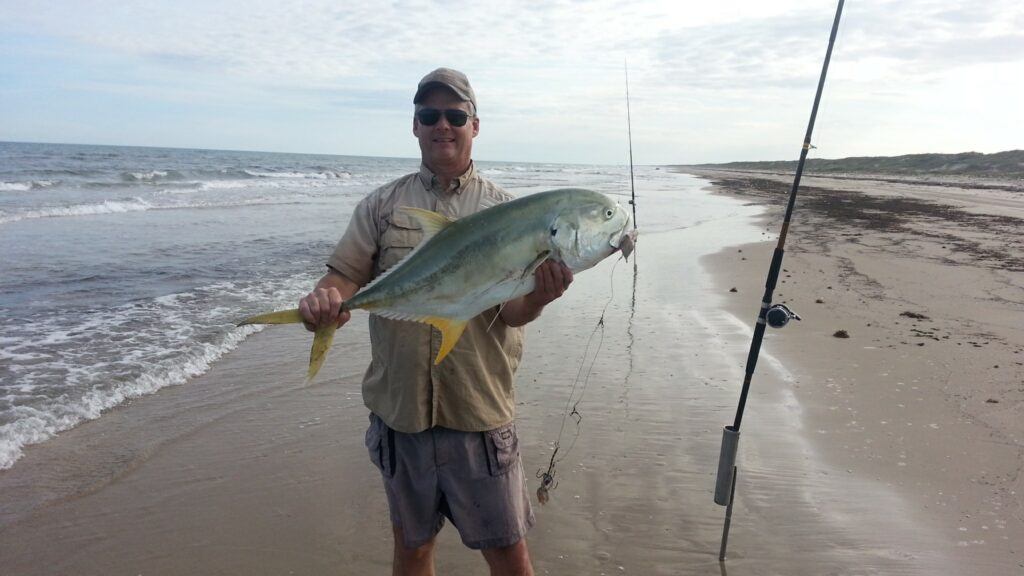 Author with a large jack crevalle caught from the beach at Padre Island National Seashore