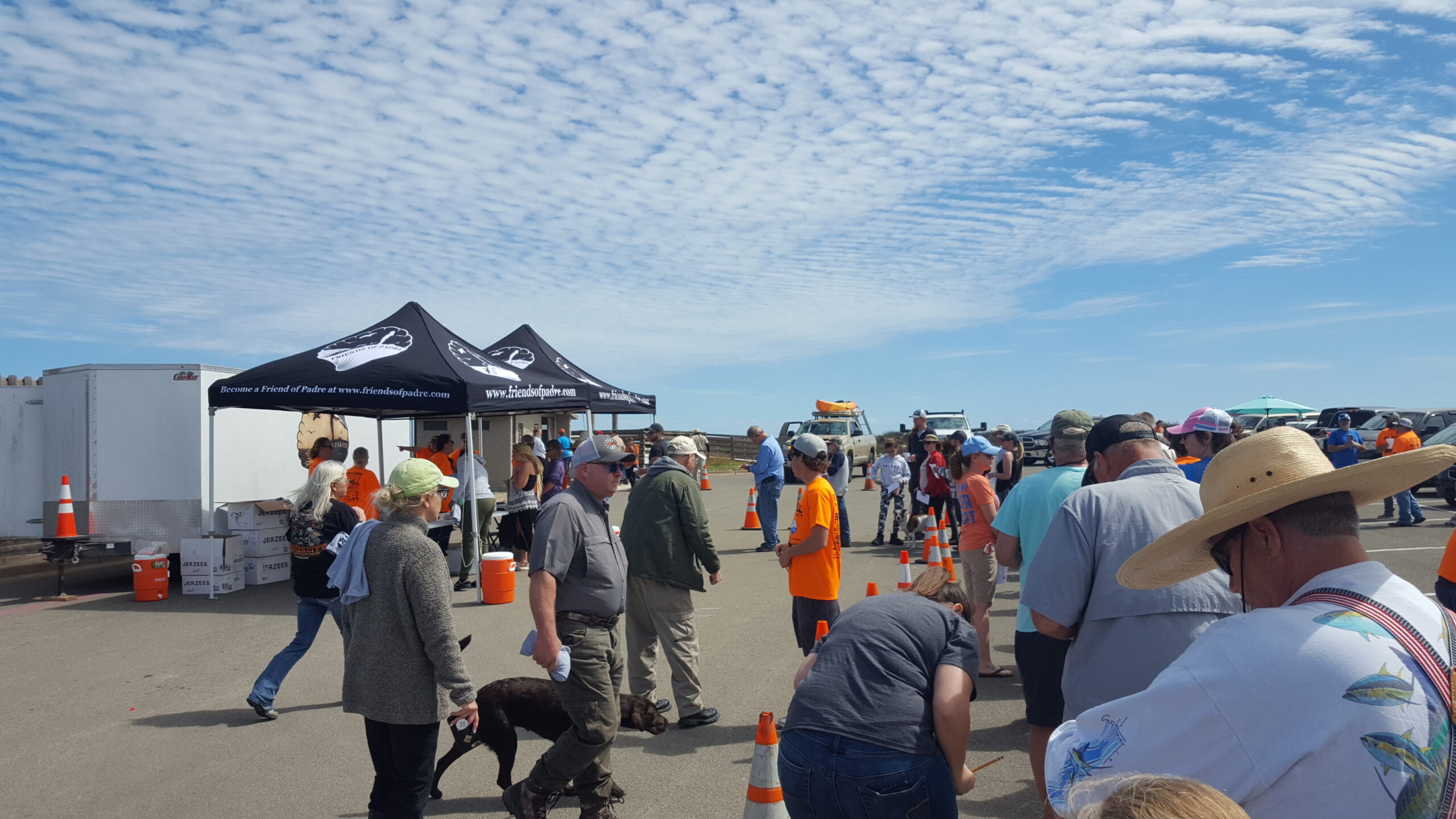 Billy Sandifer Big Shell Beach Clean up - volunteers picking up their event Tshirts