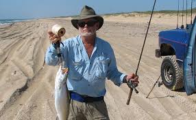 Captain Billy Sandifer with a nice surf speckled trout