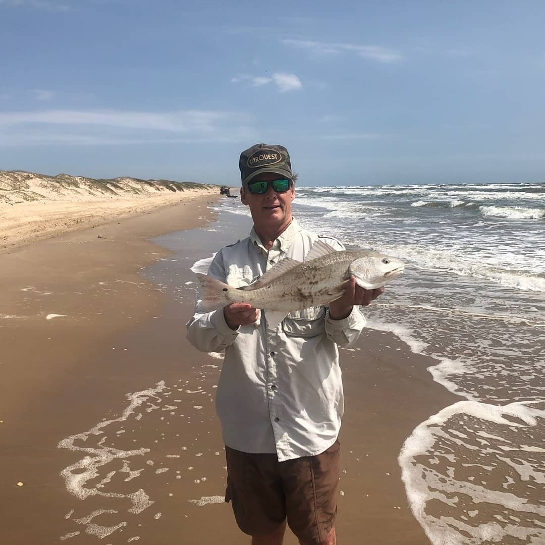 Rex McMahon with a surf caught redfish