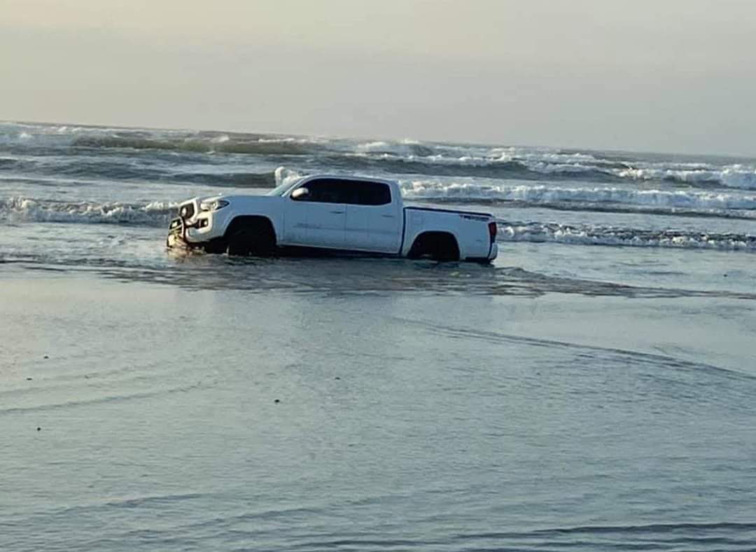 buried on the beach