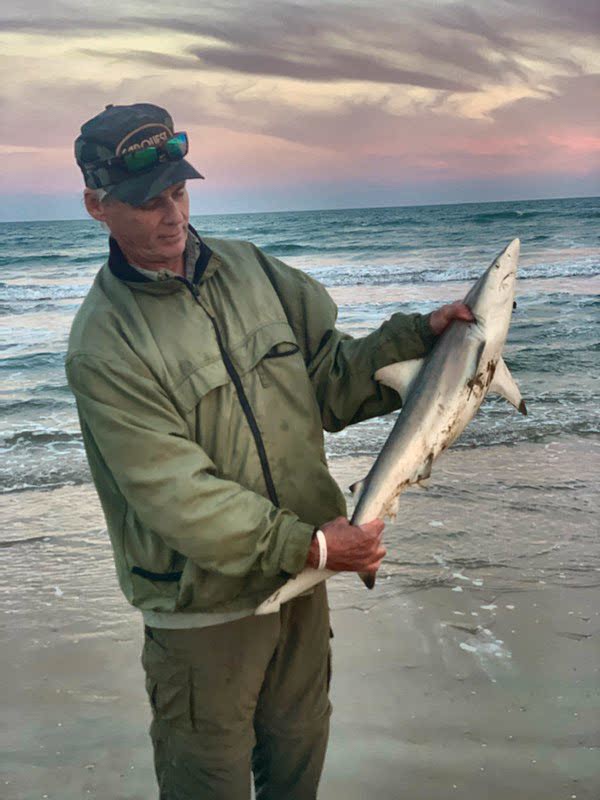 wintertime surf fishing - Rex McMahon with a 3 ft blacktip shark