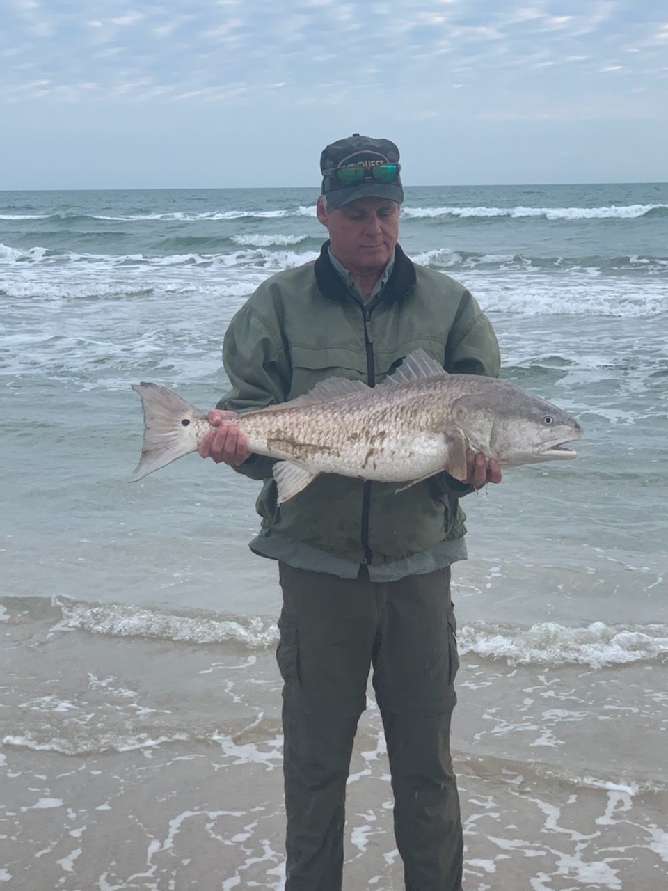 Bull Redfish from the surf. Surf Fishing Quick Start Guide Review.