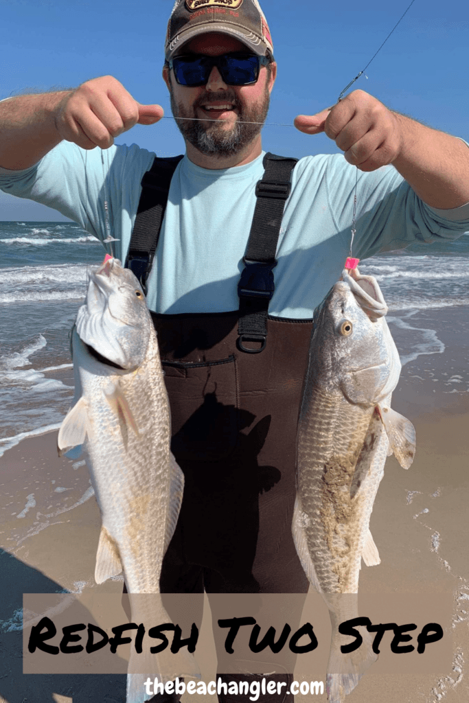 Fisherman with a double on slot redfish using fishbites synthetic strip baits.