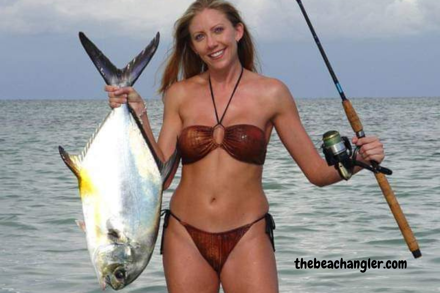 Surf fishing for Pompano. Lady with a big pompano caught from the beach.