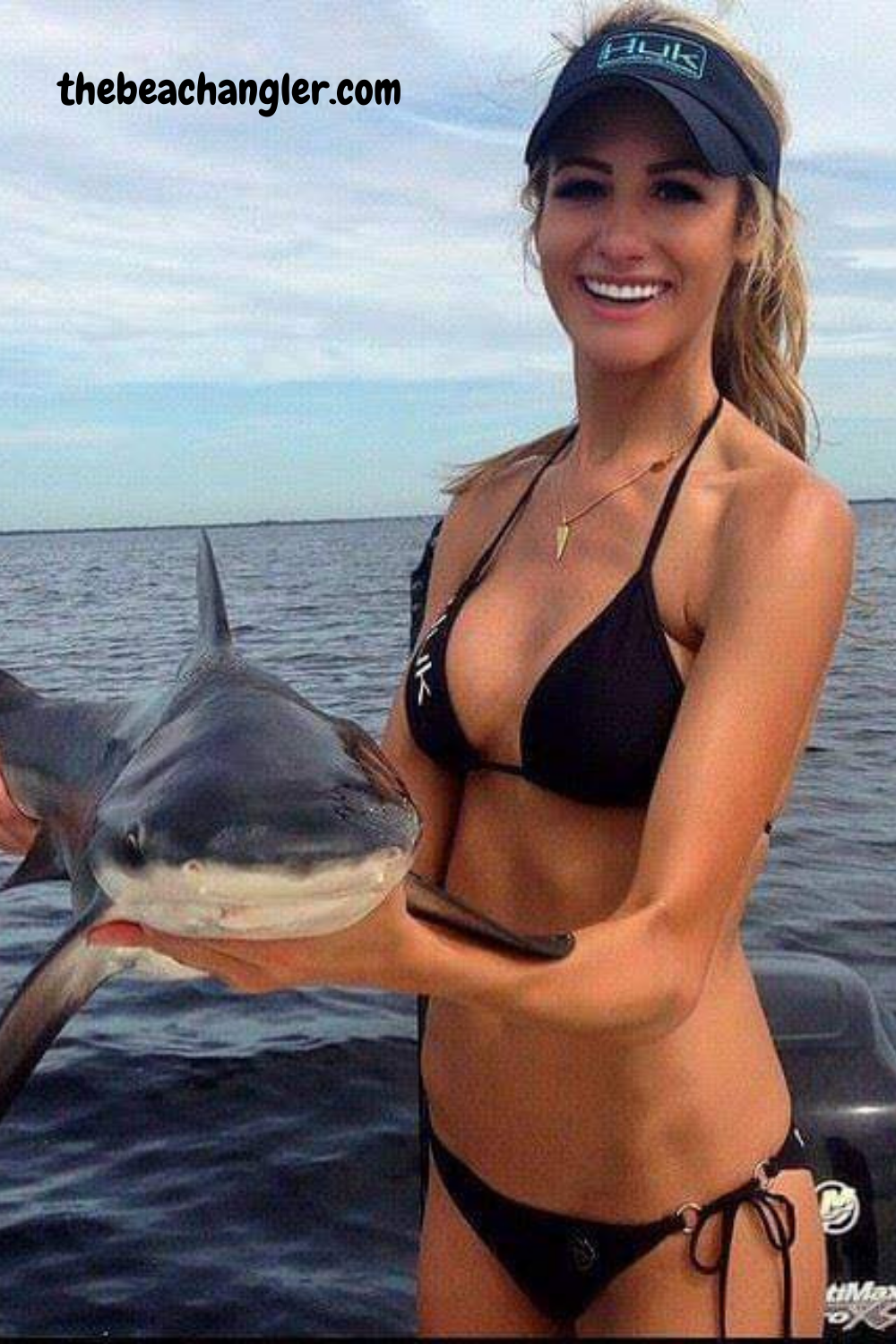 Lady with a nice blacktip shark caught off the Texas Beach Front