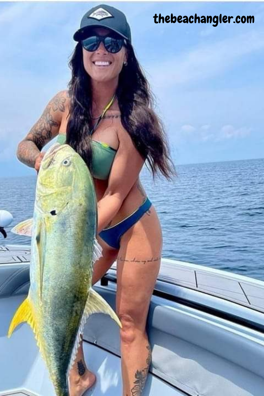 lady with a large Jack Crevalle caught off the beach