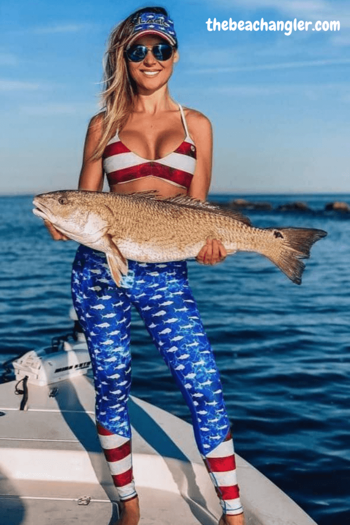 Lady with a upper slot redfish - Her dad took the time to take her fishing