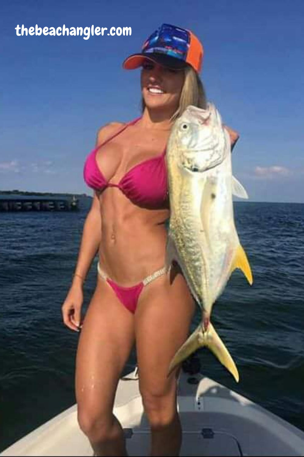Lady with a large Jack Crevalle. One of the many fish you can catch drone fishing with the Swellpro Splash Drone