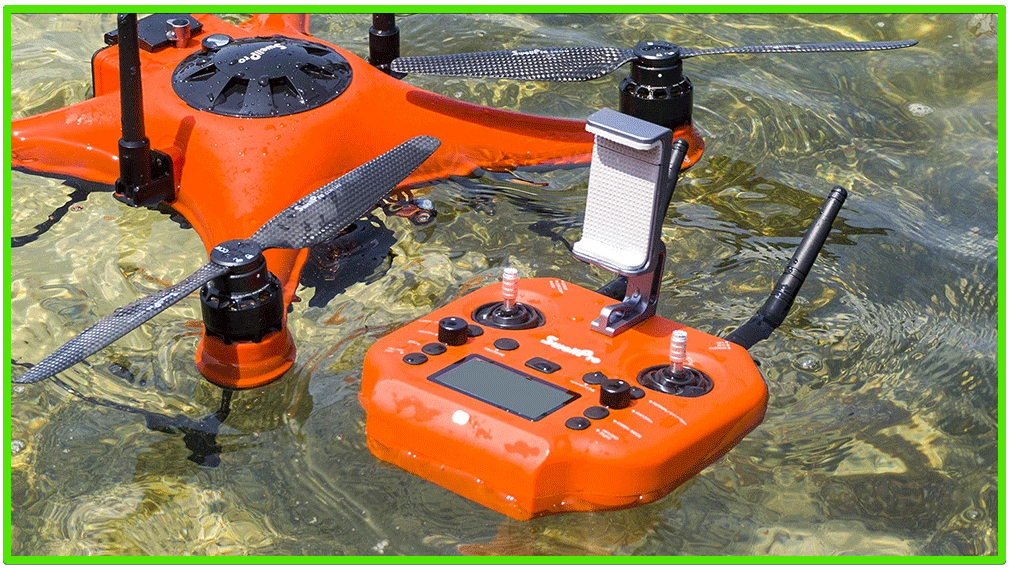 The SwellPro Splash Drone 4 and it's controller both floating in the water. 100% waterproof.
