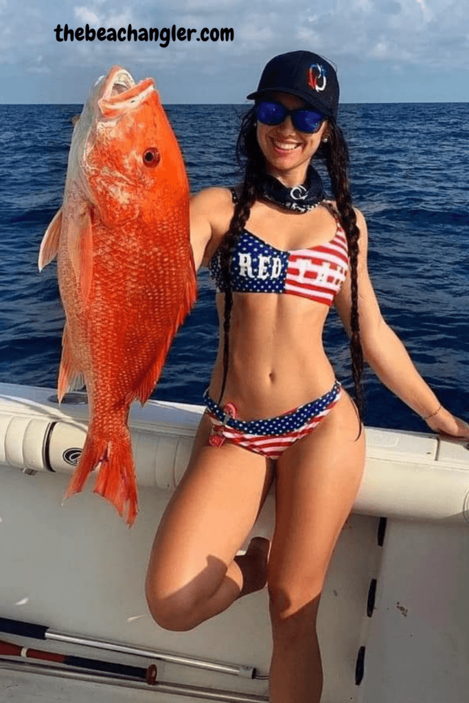 Young Lady with a big sow red snapper - Cobra marine radios review