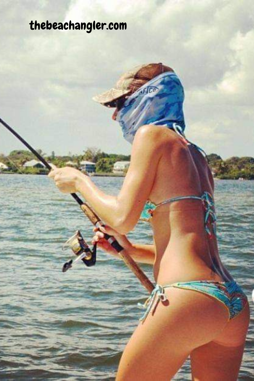 Lady hooked up with a nice fish using a Piscifun spinning reel - Piscifun fishing reels review