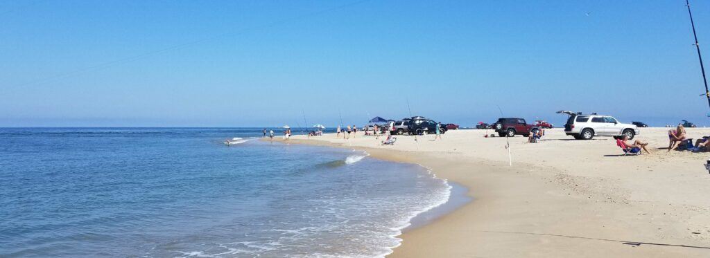 Surf fishing a point on the beach