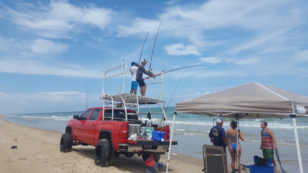 Shark fishing from a pickup-mounted elevated shark fishing platform
