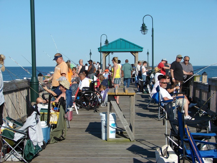 a crowded fishing pier