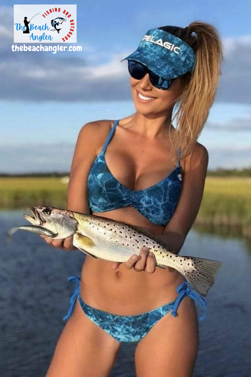 surf fishing gulf shores alabama - Bikini clad lady angler holding a nice speckled trout caught in Gulf Shores Alabama