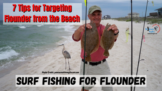 Angler holding two flounder caught while surf fishing for flounder