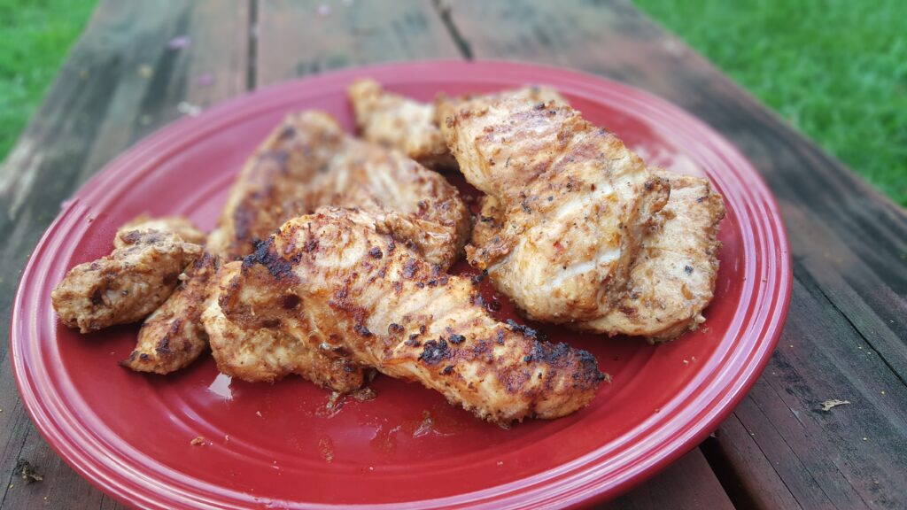 A plate of grilled alligator gar steaks - fishing for alligator gar