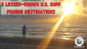 Lesser-known surf fishing spots in the U.S. - Surf angler casting from the beach with the sun rising over the water