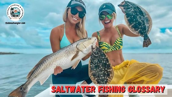 saltwater fishing glossary featured image - two lady anglers in a boat one holding a large red drum and the other holding up two nice flounder