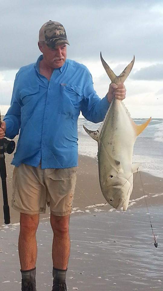 Big Jack Crevalle caught by Ken Kuhn using a 12-foot casting surf fishing rod
