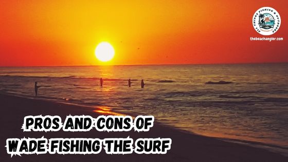 wading the surf showing several anglers waist-deep fishing the surf with a brilliant orange sunrise in the background