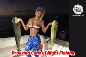 the pros and cons of night fishing. Lady angler standing in the back of a boat at night while holding up two mahi mahi.