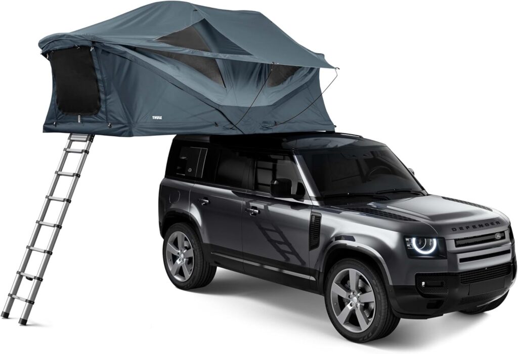 Thule Approach Medium Rooftop Tent mounted on an SUV.