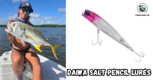 Daiwa Salt Pencil Lures featured image showing a lady angler sitting in a boat holding up a large jack crevalle.