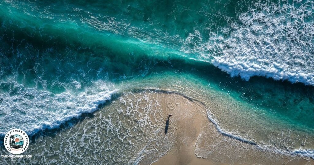 Aerial view of a pinched gut in the surf.